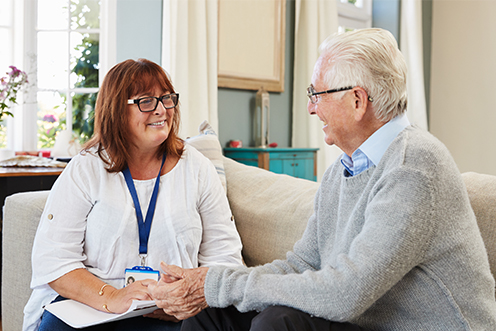 A social worker and senior male.